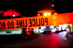 police lights and crime scene tape "do not cross"