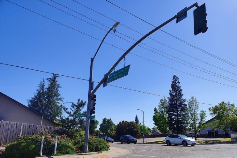 Street sign blowing in the wind